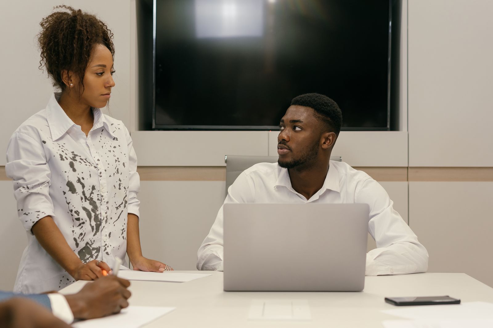 A team reviewing device security on a laptop